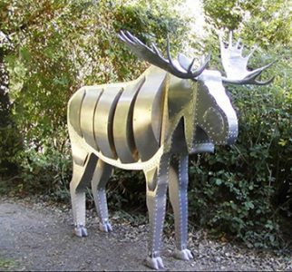 Photo of Ken Kalman's sculpture "Moose". Artwork depicts a large aluminum moose.