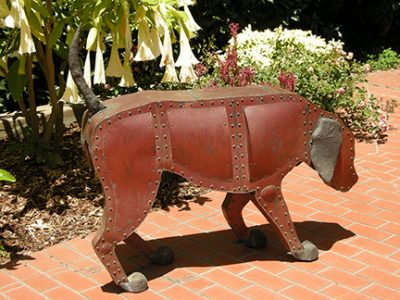 Photo of Ken Kalman's sculpture "Greyhound 2" Artwork depicts an aluminum greyhound dog.