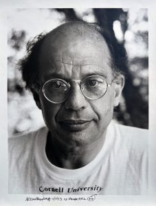 Back and white photograph of Allen Ginsberg from the neck up.