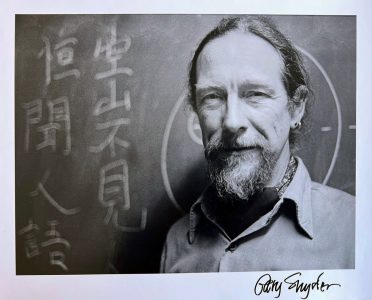 Black and white photograph of poet Gary Snyder by Christopher Felver.
