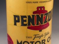 Ceramic replica of a vintage yellow Pennzoil can with a red bell logo