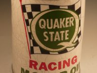 Ceramic replica of a vintage Quaker Old can with a checkered flag logo