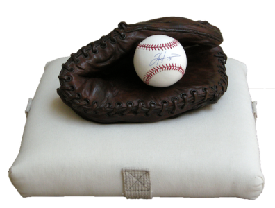 Photo of Richard Newman's sculpture "Seasons Slide by Faster Now." Artwork depicts a baseball glove on a base.